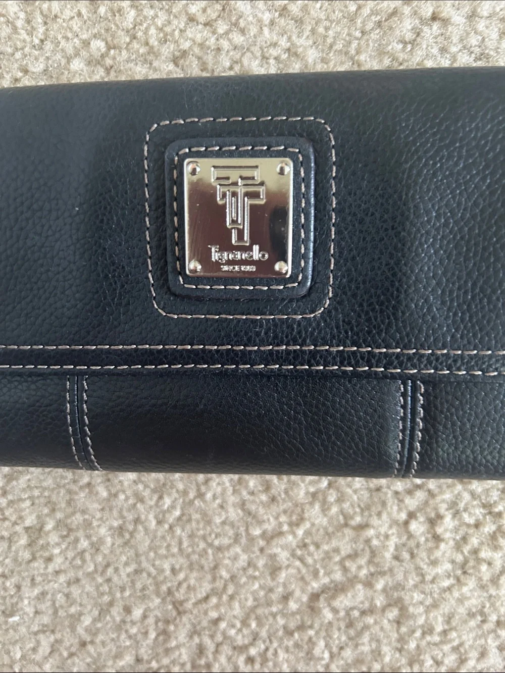 Tignanello Black Pebbled Leather Continental Wallet with Silver Tone Logo Plaque